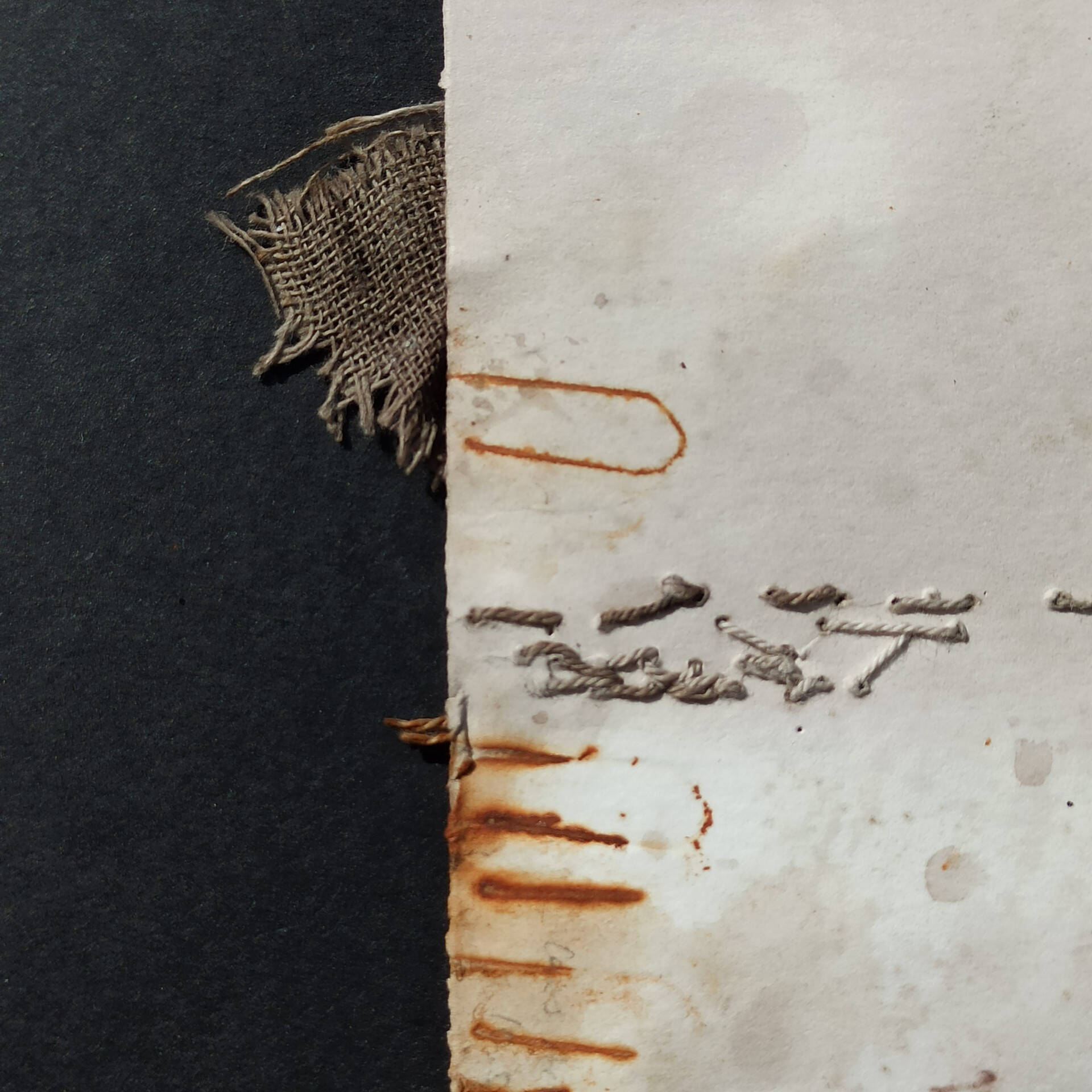 Abstract Image with Burlap Fabric and Rusted Nails